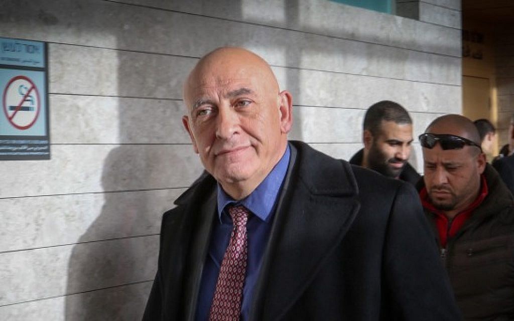 Former Joint Arab List member Basel Ghattas arrives for a court hearing at the Lod Magistrate's Court, January 8, 2017. (Roy Alima/Flash90)