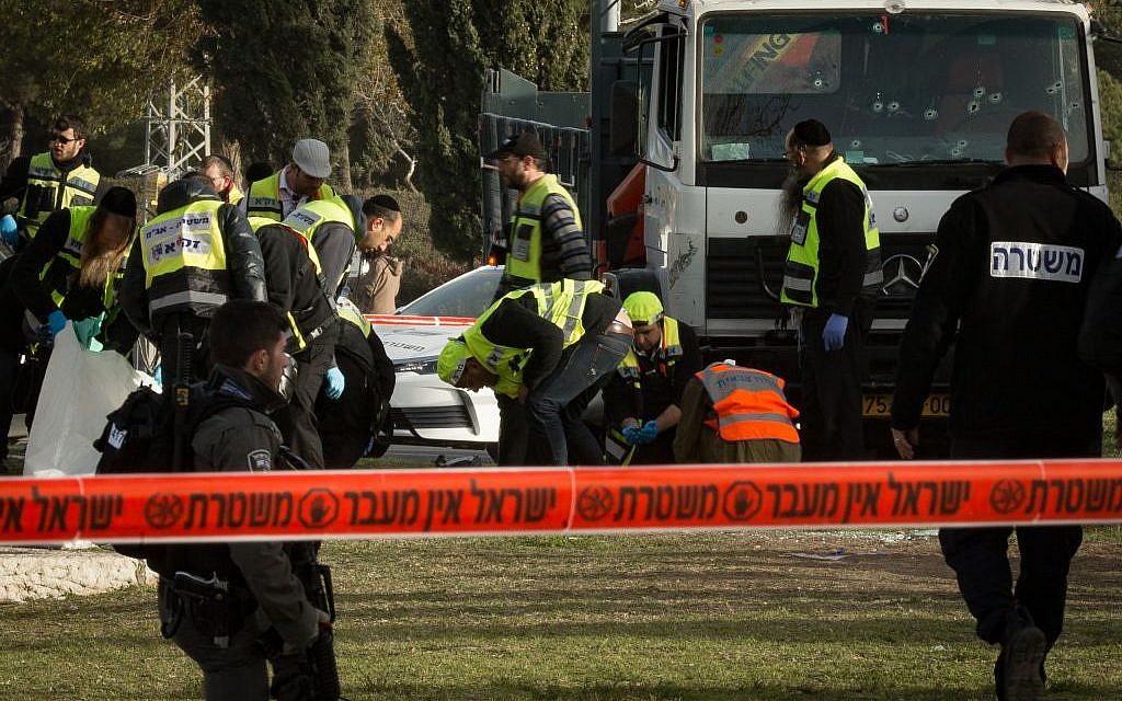 The scene where a truck rammed into a group of Israeli soldiers, killing at least four in the Armon Hanetziv neighborhood of Jerusalem. (Sebi Berens/Flash90)