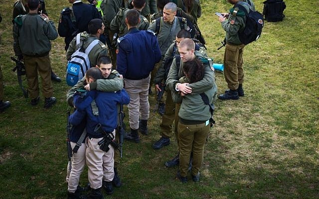 Israeli soldiers react at the scene where a truck rammed in a group of Israeli soldiers, killing four in Jerusalem on January 8, 2017. (Shlomi Cohen/Flash90) Israeli soldiers react at the scene where a truck rammed in a group of Israeli soldiers, killing four in Jerusalem on January 8, 2017. (Shlomi Cohen/Flash90)