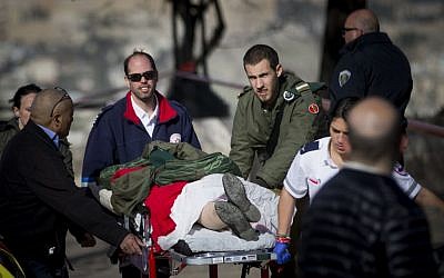 The scene where a truck rammed into a group of Israeli soldiers, killing at least four in a suspected vehicle-ramming attack, in the Armon Hanetziv neighborhood of Jerusalem.  (Yonatan Sindel/Flash90)