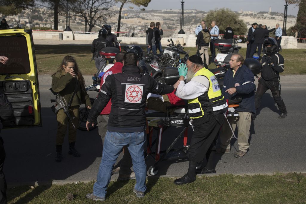 The scene where a truck rammed into a group of Israeli soldiers, killing at least four in a suspected vehicle-ramming attack, in the Armon Hanetziv neighborhood of Jerusalem. (Yonatan Sindel/Flash90) The scene where a truck rammed into a group of Israeli soldiers, killing at least four in a suspected vehicle-ramming attack, in the Armon Hanetziv neighborhood of Jerusalem. (Yonatan Sindel/Flash90)