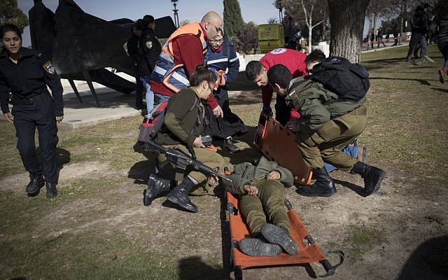 The scene where a truck rammed into a group of Israeli soldiers, killing at least four in a vehicle-ramming attack, in the Armon Hanatziv neighborhood of Jerusalem. (Yonatan Sindel/Flash90) The scene where a truck rammed into a group of Israeli soldiers, killing at least four in a vehicle-ramming attack, in the Armon Hanatziv neighborhood of Jerusalem. (Yonatan Sindel/Flash90)