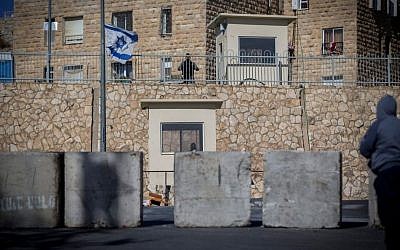 Illustrative. Israeli Border Police officers guard near a road block at the entrance to the East Jerusalem neighborhood of Jabel Mukaber on January 09, 2017. (Yonatan Sindel/Flash90)