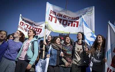 Israeli settlers protest the planned eviction of the outpost of Amona, in front of the Israeli parliament, January 30, 2017. (Hadas Parush/Flash90)