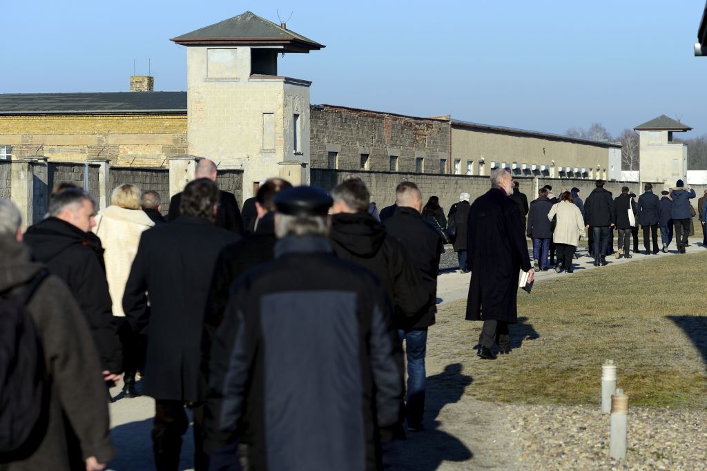 Visitors walk at the Sachsenhausen concentration camp memorial in Oranienburg, Germany, Friday, Jan. 27, 2017 on the Holocaust Remembrance Day. (Maurizio Gambarini/dpa via AP) Visitors walk at the Sachsenhausen concentration camp memorial in Oranienburg, Germany, Friday, Jan. 27, 2017 on the Holocaust Remembrance Day. (Maurizio Gambarini/dpa via AP)