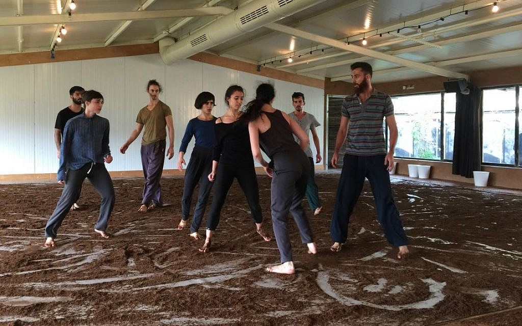Eight members of modern dance troupe Vertigo show part of their newest piece, 'One. One and One," created in celebration of the group's 25th anniversary celebration (Jessica Steinberg/Times of Israel) Eight members of modern dance troupe Vertigo show part of their newest piece, 'One. One and One," created in celebration of the group's 25th anniversary celebration (Jessica Steinberg/Times of Israel)