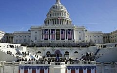 In this Jan. 15, 2016, photo, the US Capitol frames the backdrop over the stage during a rehearsal of President-elect Donald Trump's swearing-in ceremony in Washington. (AP Photo/Patrick Semansky)