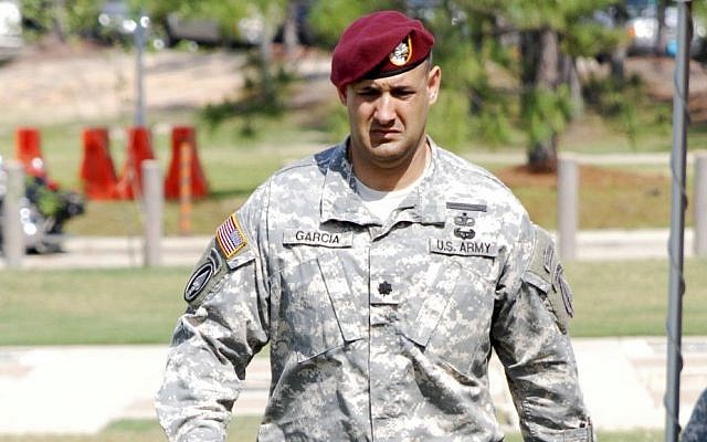 Then-Lt. Col. Victor Garcia walks during a change of command ceremony at Fort Bragg, N.C. Staff Sgt. Christopher Franklin/U.S. Army via AP) 