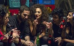 This undated handout photo provided by Deux Beaux Garcon Films shows a scene from the movie 'In Between', the new award-winning film about Arab women battling their conservative society, (Itay Gross, Deux Beaux Garcon Films via AP)