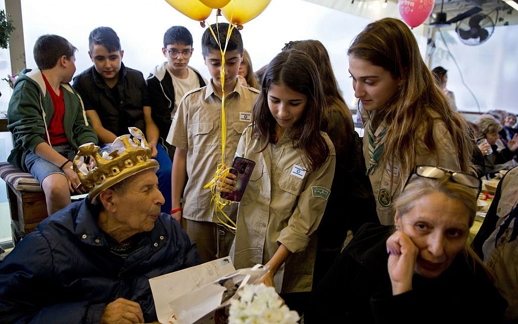 Holocaust survivor Ernest Weiner is visited by scouts during his 92nd birthday in a restaurant in the central Israeli city of Ramat Hasharon on Jan. 24, 2017. (AP Photo/Sebastian Scheiner) Holocaust survivor Ernest Weiner is visited by scouts during his 92nd birthday in a restaurant in the central Israeli city of Ramat Hasharon on Jan. 24, 2017. (AP Photo/Sebastian Scheiner)