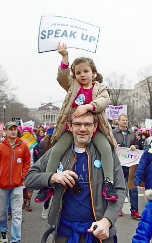 A very young woman and a man were among supporters marching on Washington on Saturday, January 21. (Ron Sachs/National Council of Jewish Women)