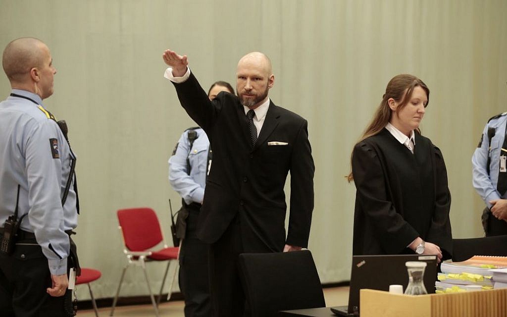 Norwegian mass murderer Anders Behring Breivik making a neo-Nazi salute, as judges began reviewing a government appeal against a ruling that his solitary confinement was inhumane and violated human rights on Jan. 10, 2017. (Lise Aaserud/NTB Scanpix via AP) Norwegian mass murderer Anders Behring Breivik making a neo-Nazi salute, as judges began reviewing a government appeal against a ruling that his solitary confinement was inhumane and violated human rights on Jan. 10, 2017. (Lise Aaserud/NTB Scanpix via AP)