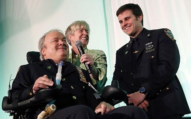 New York City Detective Steven McDonald, his wife Patti, and son, Conor, smile after receiving the Spirit of Giving Award at the Kelly Cares Foundation's 5th Annual Irish Eyes Gala held at the JW Marriot Essex House in New York, March 15, 2015. (Stuart Ramson/Invision for Kelly Cares Foundation/AP Images) New York City Detective Steven McDonald, his wife Patti, and son, Conor, smile after receiving the Spirit of Giving Award at the Kelly Cares Foundation's 5th Annual Irish Eyes Gala held at the JW Marriot Essex House in New York, March 15, 2015. (Stuart Ramson/Invision for Kelly Cares Foundation/AP Images)