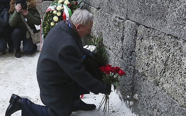 A Holocaust survivor places flowers in commemoration of the people killed by the Nazis at Auschwitz in Oswiecim, Poland on Jan. 27, 2017, the anniversary of the 1945 liberation of the Nazi death camp and International Holocaust Remembrance Day. (AP Photo/Czarek Sokolowski) A Holocaust survivor places flowers in commemoration of the people killed by the Nazis at Auschwitz in Oswiecim, Poland on Jan. 27, 2017, the anniversary of the 1945 liberation of the Nazi death camp and International Holocaust Remembrance Day. (AP Photo/Czarek Sokolowski)