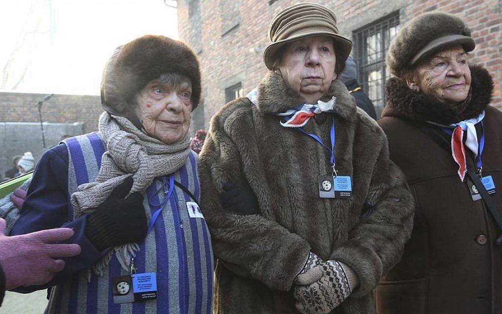 Holocaust survivors commemorate people killed by the Nazis at the former Nazi death camp in Auschwitz, Poland, Friday, Jan. 27, 2017, on International Holocaust Remembrance Day (Czarek Sokolowski/AP)
