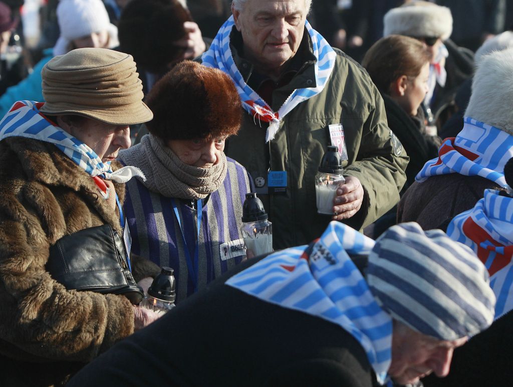 Holocaust survivors light candles at the International Monument to the Victims of Fascism, after a ceremony marking the 72nd anniversary of the liberation of the Nazi death camp Auschwitz-Birkenau, in Oswiecim, Poland, Friday, Jan. 27, 2017, on the International Holocaust Remembrance Day. (AP Photo/Czarek Sokolowski) Holocaust survivors light candles at the International Monument to the Victims of Fascism, after a ceremony marking the 72nd anniversary of the liberation of the Nazi death camp Auschwitz-Birkenau, in Oswiecim, Poland, Friday, Jan. 27, 2017, on the International Holocaust Remembrance Day. (AP Photo/Czarek Sokolowski)