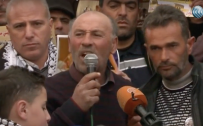 Screenshot of Fathi al-Sharif, the uncle of Abdel Fattah al-Sharif, who told a crowd in Hebron on January 4, 2017, that he would take his nephew's case to an international court. (Courtesy al-Ghad TV)