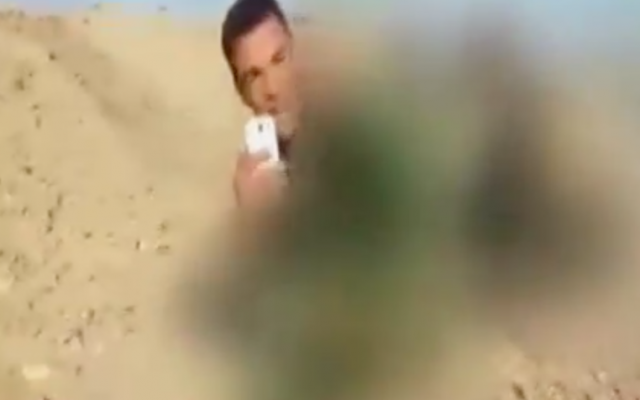 Ben Hassin, in footage reportedly taken when he was fighting against Islamic State (Channel 2 screenshot)