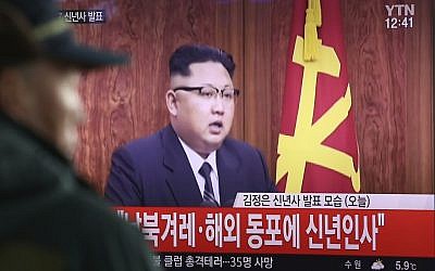 A South Korean man watches North Korean leader Kim Jong Un delivering his New Year's speech on a TV news program shown at the Seoul Railway Station in Seoul, South Korea, January 1, 2017. (AP/Ahn Young-joon)