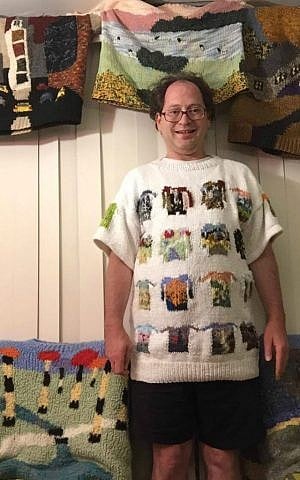 Sam Barsky displays his 100th sweater, a compilation of miniature versions of his previous works. (Courtesy/Facebook)