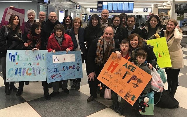 Members of Am Shalom welcoming a Syrian refugee family at O’Hare International Airport in Chicago, Jan. 27, 2017. (Courtesy Am Shalom) Members of Am Shalom welcoming a Syrian refugee family at O’Hare International Airport in Chicago, Jan. 27, 2017. (Courtesy Am Shalom)