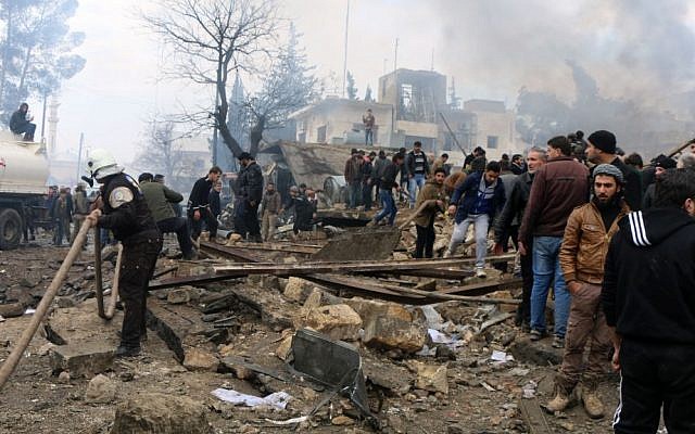 Rescue workers attend to wreckage after dozens were killed when a car bomb went off in a busy market in a rebel-held Syrian town of Azaz along the Turkish border, Saturday, Jan. 7, 2017 (Saif Alnajdi, via AP) Rescue workers attend to wreckage after dozens were killed when a car bomb went off in a busy market in a rebel-held Syrian town of Azaz along the Turkish border, Saturday, Jan. 7, 2017 (Saif Alnajdi, via AP)