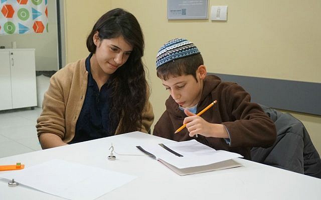 Tikkun Olam Makers teams crate crafting tools to help those with partial hand parlysis work better at school (Courtesy)