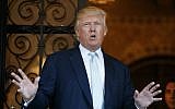 President-elect Donald Trump speaks to reporters at Mar-a-Lago in Palm Beach, Florida, December 28, 2016. (AP Photo/Evan Vucci)