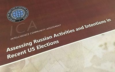 A part of the declassified version Intelligence Community Assessment on Russia's efforts to interfere with the US political process is photographed in Washington on Jan. 6, 2017. (AP Photo/Jon Elswick)