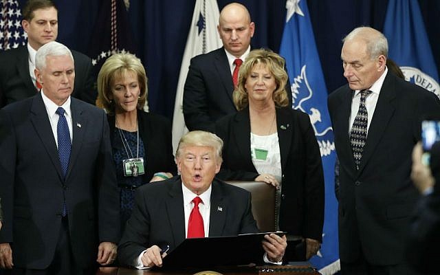 President Donald Trump, accompanied by Vice President Mike Pence, Homeland Security Secretary John F. Kelly, and others, speaks during a visit to the Homeland Security Department in Washington, Wednesday, Jan. 25, 2017. (AP Photo/Pablo Martinez Monsivais) President Donald Trump, accompanied by Vice President Mike Pence, Homeland Security Secretary John F. Kelly, and others, speaks during a visit to the Homeland Security Department in Washington, Wednesday, Jan. 25, 2017. (AP Photo/Pablo Martinez Monsivais)