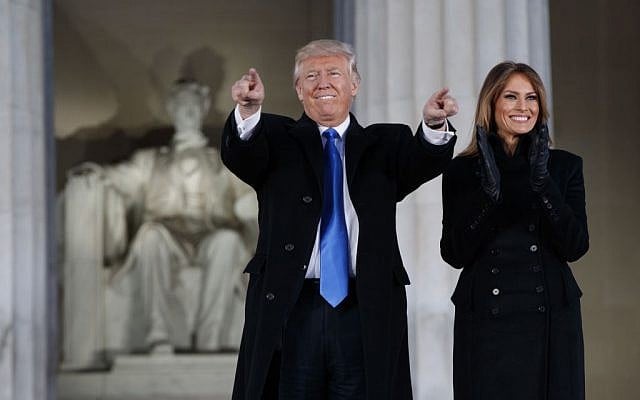President-elect Donald Trump, left, and his wife Melania Trump arrive to the "Make America Great Again Welcome Concert" at the Lincoln Memorial, Thursday, January 19, 2017, in Washington. (AP/Evan Vucci)