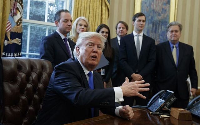 President Donald Trump talks with reporters in the Oval Office of the White House in Washington, Tuesday, Jan. 24, 2017, before signing an executive order on the Keystone XL pipeline. (AP/Evan Vucci) President Donald Trump talks with reporters in the Oval Office of the White House in Washington, Tuesday, Jan. 24, 2017, before signing an executive order on the Keystone XL pipeline. (AP/Evan Vucci)