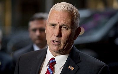 Vice President-elect Mike Pence speaks to members of the media as he arrives at Trump Tower in New York, Tuesday, January 3, 2017. (AP Photo/Andrew Harnik)