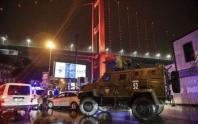 A police armored vehicle blocks the road leading to the scene of an gun attack in Istanbul, January 1, 2017. (AP)