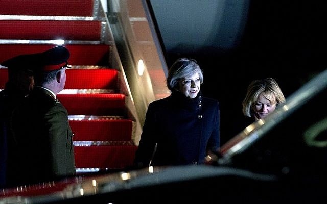 British Prime Minister Theresa May steps off her plane upon her arrival at Andrews Air Force Base, Md., Thursday, Jan. 26, 2017. ( AP Photo/Jose Luis Magana)