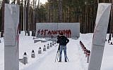 A Nazi symbol is seen painted on a memorial stone at a cemetery where Poles are buried in Bykivnia near the capital Kiev, Ukraine, Wednesday, Jan. 25, 2017. The inscription reads SS Galitchina, a reference to the Galicia division of the Nazi SS organization made up mostly of ethnic Ukrainian volunteers during WW II (AP Photo/Efrem Lukatsky)