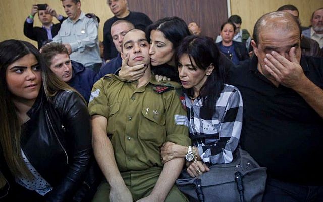 Elior Azaria, the Israeli soldier who shot a Palestinian terrorist in Hebron arrives to the court room before the announcement of his verdict, January 4, 2017 (Miriam Alster/Flash90) Elior Azaria, the Israeli soldier who shot a Palestinian terrorist in Hebron arrives to the court room before the announcement of his verdict, January 4, 2017 (Miriam Alster/Flash90)