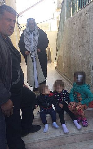 Relatives of Jerusalem terrorist Ibrahim Fadi al-Qunbar, in their home village of Jabel Muqabar, January 10, 2016 (Avi Issacharoff)
