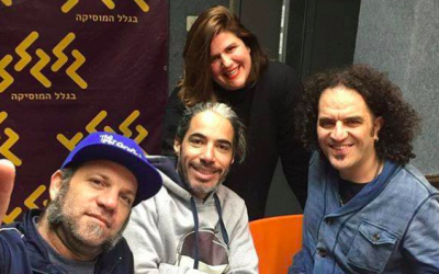 Shaanan Streett (left), Guy Mar and Yair Cohen Harounoff of Hadag Nahash with Hadar Marks (top) at Galgalatz radio station. (Courtesy Galgalatz)