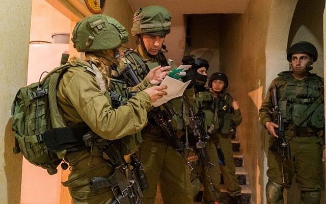 Illustrative: IDF troops make a late-night arrest in the West Bank on January 11, 2017. (IDF Spokesperson's Unit) Illustrative: IDF troops make a late-night arrest in the West Bank on January 11, 2017. (IDF Spokesperson's Unit)