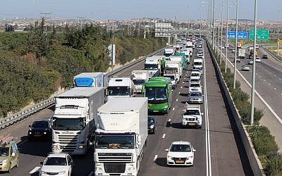 A convoy of protesters cruise down Highway 1 on their way to the Knesset in Jerusalem, on January 23, 2017, demanding, among a number of things, a freeze on demolitions of illegally built Arab homes until the government provides building plans for Arab communities across the country. (Credit: Courtesy) A convoy of protesters cruise down Highway 1 on their way to the Knesset in Jerusalem, on January 23, 2017, demanding, among a number of things, a freeze on demolitions of illegally built Arab homes until the government provides building plans for Arab communities across the country. (Credit: Courtesy)