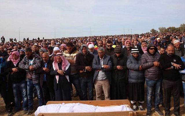 Mourners attend the funeral of Yaqoub Mousa Abu Al-Qia’an, killed in violent clashes over during house demolitions in the Bedouin village, near Hura on January 24, 2017. (Joint List Spokesperson) Mourners attend the funeral of Yaqoub Mousa Abu Al-Qia’an, killed in violent clashes over during house demolitions in the Bedouin village, near Hura on January 24, 2017. (Joint List Spokesperson)