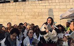 Members of the Women of the Wall group praying outside the entrance to the Western Wall after they were denied entry to the site for refusing to undergo body searches, despite a recent Supreme Court ruling outlawing the searches. January 19, 2017. (Courtesy of Women of the Wall)