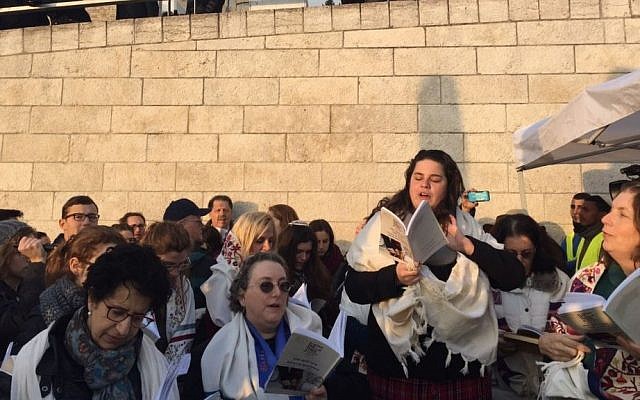 Members of the Women of the Wall group praying outside the entrance to the Western Wall after they were denied entry to the site for refusing to undergo body searches, despite a recent Supreme Court ruling outlawing the searches. January 19, 2017. (Courtesy of Women of the Wall) Members of the Women of the Wall group praying outside the entrance to the Western Wall after they were denied entry to the site for refusing to undergo body searches, despite a recent Supreme Court ruling outlawing the searches. January 19, 2017. (Courtesy of Women of the Wall)