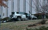 A reportedly stolen SUV that crashed into the side of the Congregation Beth El Keser Israel Synagogue in New Haven, Connecticut on January 2, 2016. (screen capture: FOX 61)