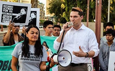 Rabbi Dr. Shmuly Yanklowitz, founder of Uri L'Tzedek: Orthodox Social Justice at a November 2014 immigrant rights protest. (courtesy)