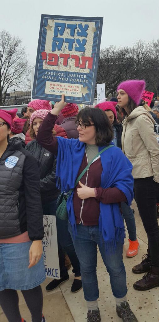 A Jewish marcher holds a sign proclaiming "Justice, justice shall you pursue" during the Women's March on Washington, January 21, 2017. (Rebecca Stoil/Times of Israel) A Jewish marcher holds a sign proclaiming "Justice, justice shall you pursue" during the Women's March on Washington, January 21, 2017. (Rebecca Stoil/Times of Israel)