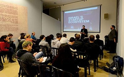 Even Frankel, Educational Programs Manager of the nonprofit organization Start-Up Nation Central, front and center, gives young professionals an in-depth look at Israel’s tech industry during Masa Israel Journey’s “Masa Fast Forward” conference at the Yitzhak Rabin Center in Tel Aviv on Sunday, January 15, 2017  (Courtesy)