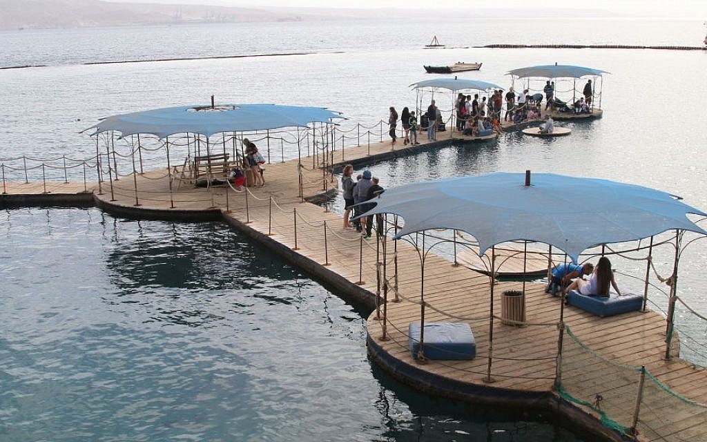 The pier at Eilat's Dolphin Reef, where trainers interact with the dolphins and provide lessons to visitors. (Shmuel Bar-Am)