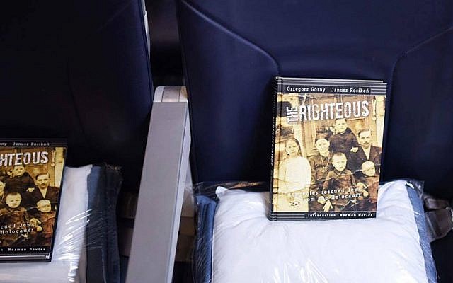 Books laid out for passengers of a LOT flight from Tel Aviv to Warsaw on Jan. 27, 2017 (Courtesy: From the Depths/JTA) Books laid out for passengers of a LOT flight from Tel Aviv to Warsaw on Jan. 27, 2017 (Courtesy: From the Depths/JTA)